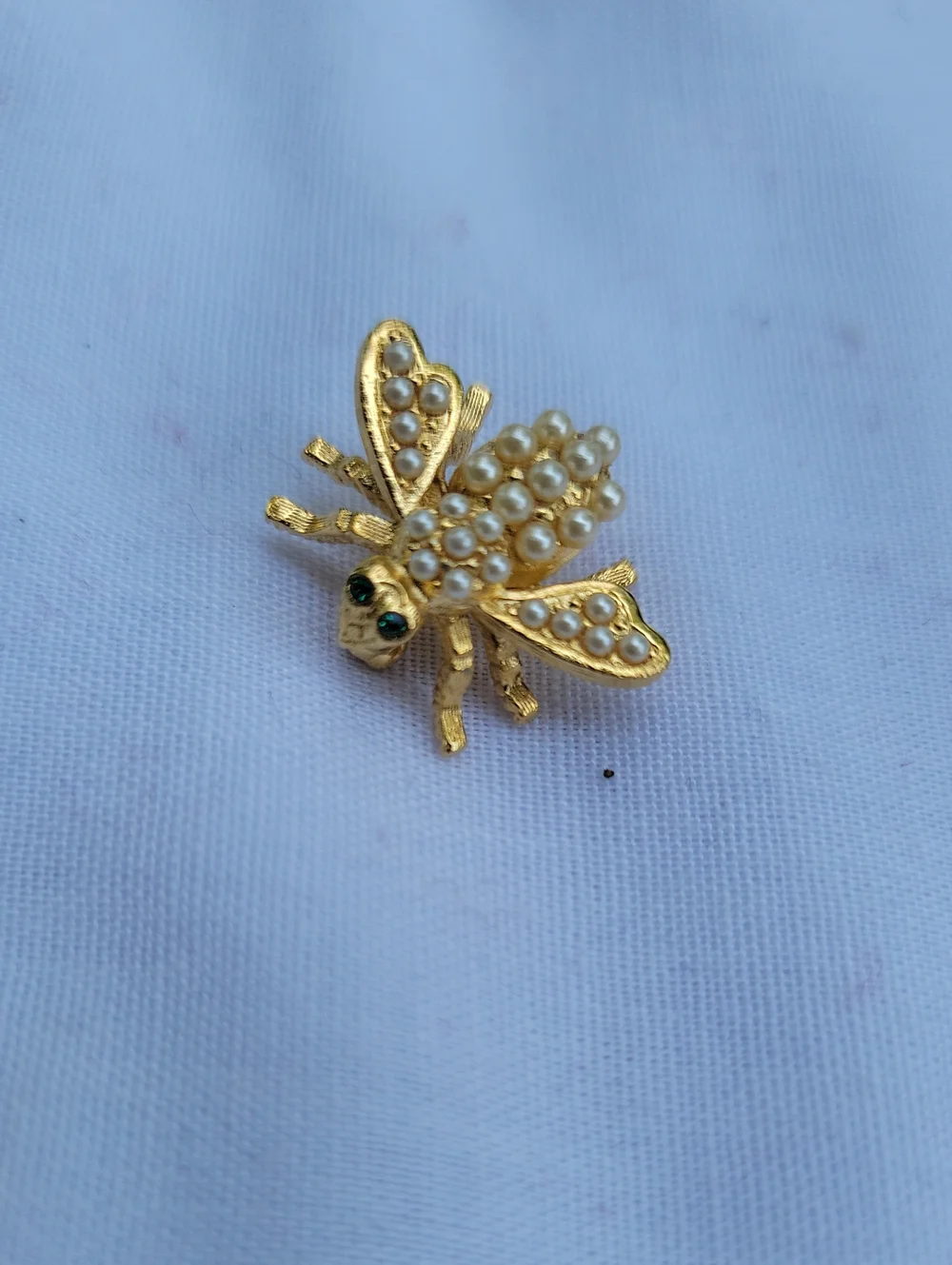 Vintage Joan Rivers Gold Bee Brooch with Pearl Accents and Green Eyes Classic